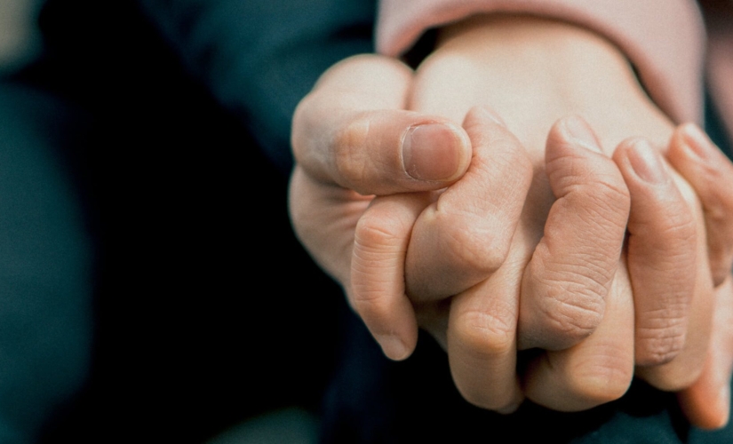 couple holding hands