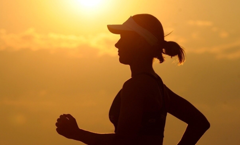 woman running at sunset