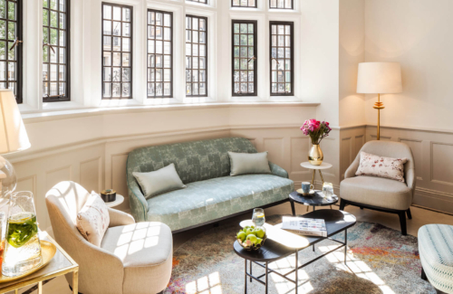 Interior image of one sofa and three chairs at The Evewell Fertility Clinic