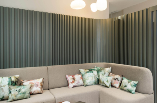 Interior of the Evewell Fertility clinic showing two sofas with cushions