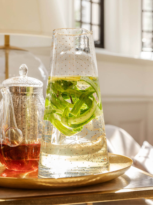 Showing tea and water with cucumber to represent fertility boosting foods