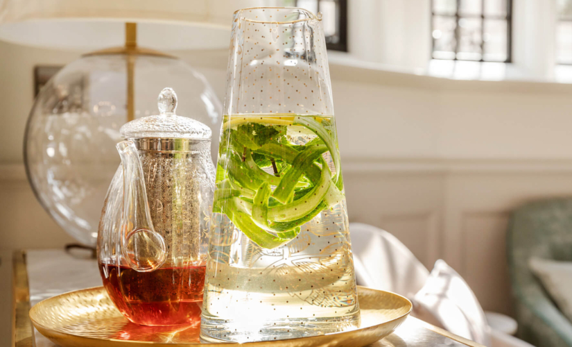 Showing tea and water with cucumber to represent fertility boosting foods