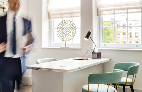 Consulting room interior showing a desk and two chairs at the Fertility Clinic